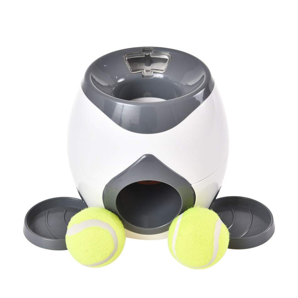 Tennis Food Reward MachineSAFE MATERIAL:  Non-odor material ABS. High-quality plastic is used to make this dog treat ball.UNIQUE FOOD LAUNCHER:  By placing the tennis ball (included) in the oTennis Food Reward MachinepetjoyzpetjoyzTennis Food Reward Machine